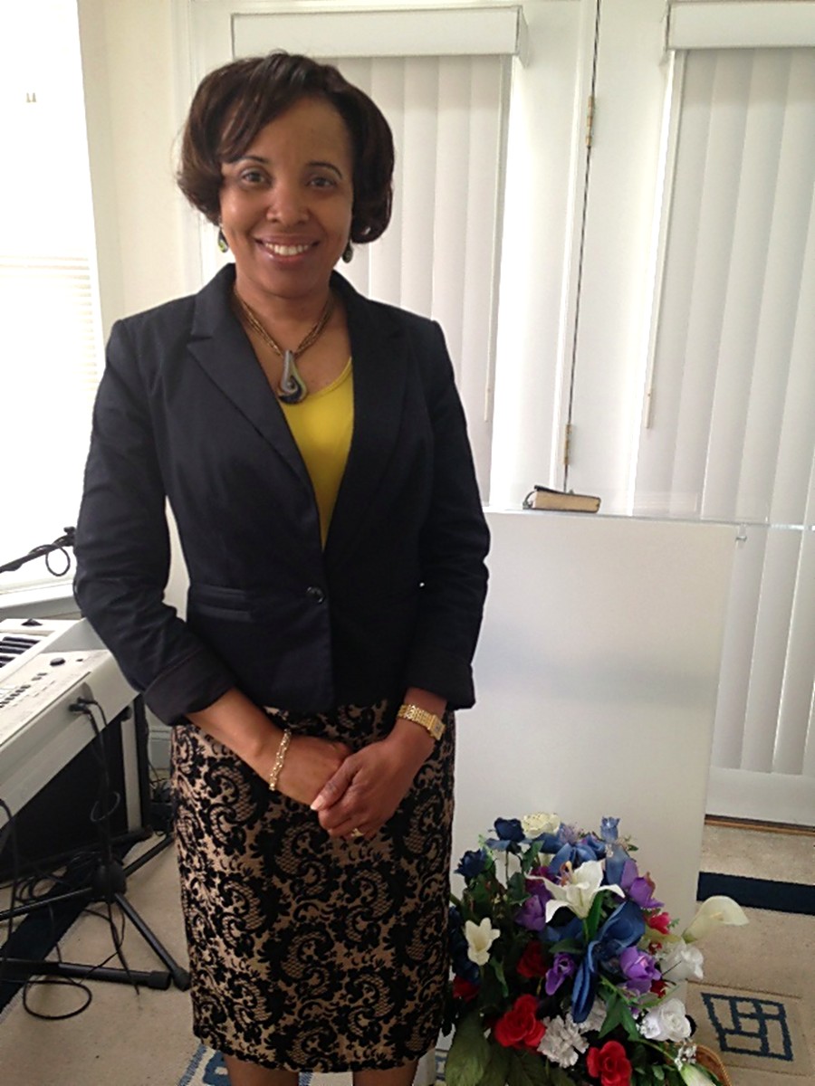 Pastor Joyce Ojiaku at the keyboard during worship