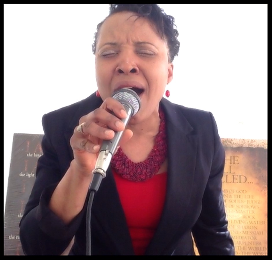 A worshipper leading song during service